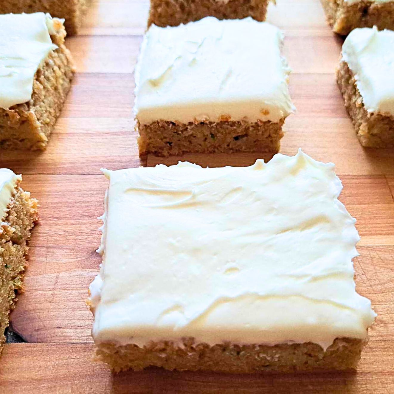 fresh milled flour zucchini bars with cream cheese frosting