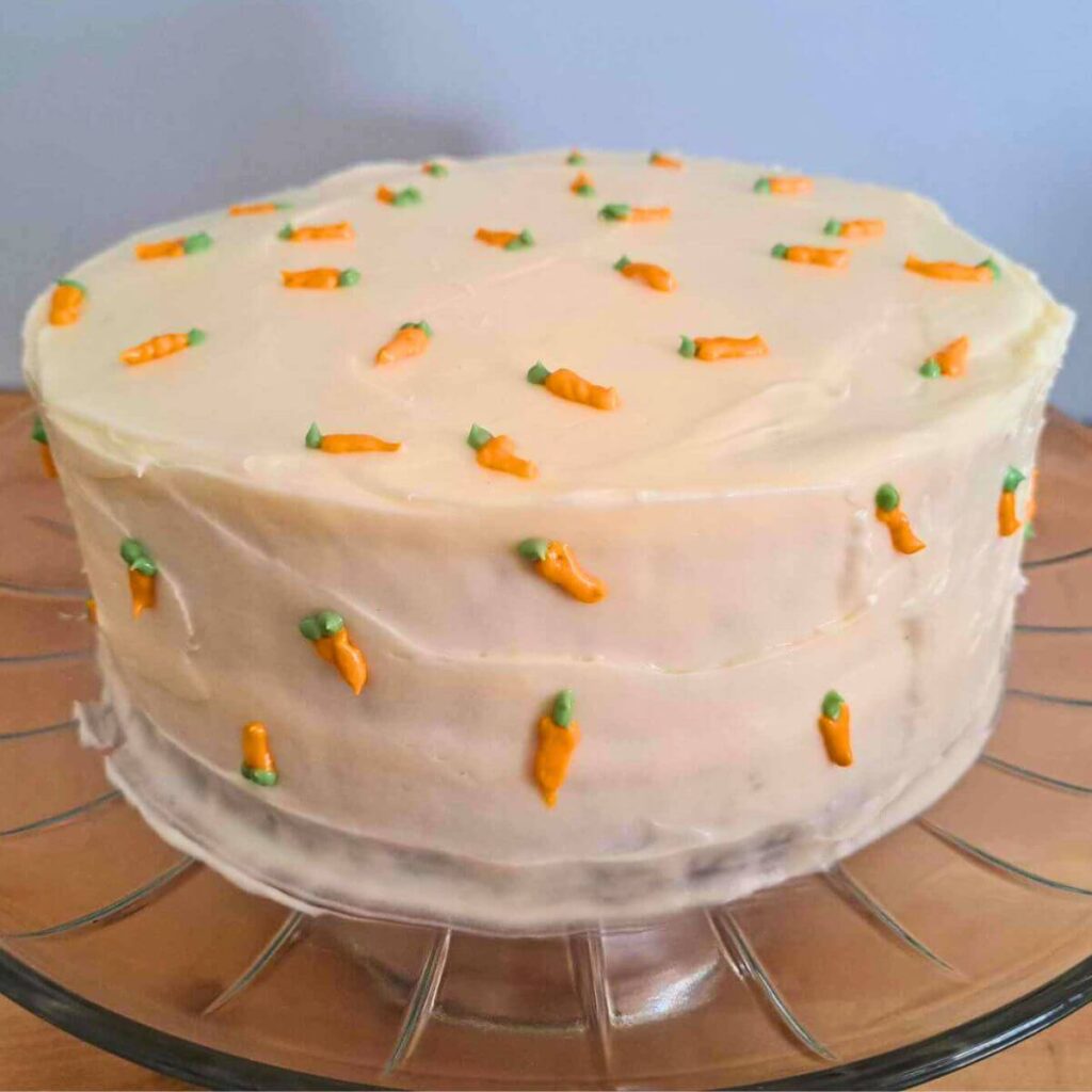 the Best Carrot cake made with fresh milled flour decorated with frosting carrots