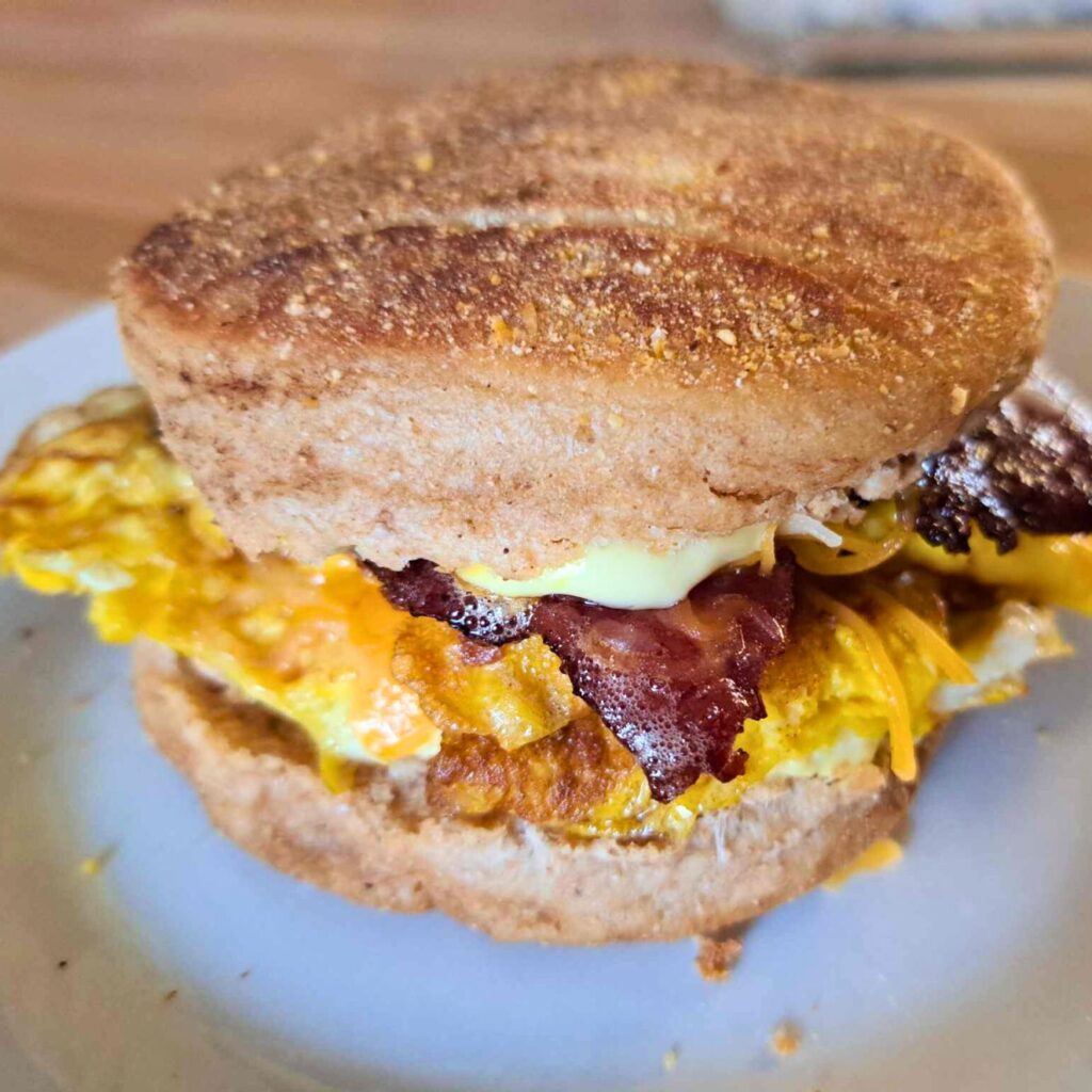 turkey bacon, egg, and cheese muffin breakfast sandwich on homemade English muffin