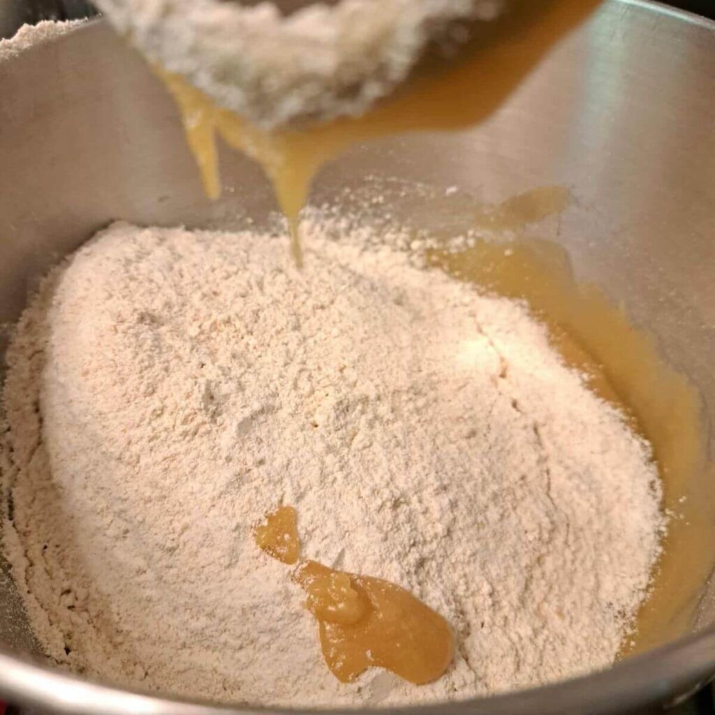 adding flour to wet ingredients for compost cookies