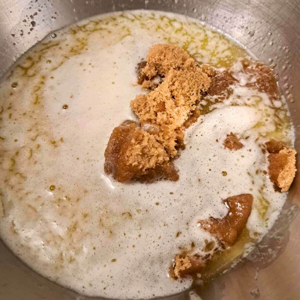 melted butter, sugar, and brown sugar in a mixing bowl