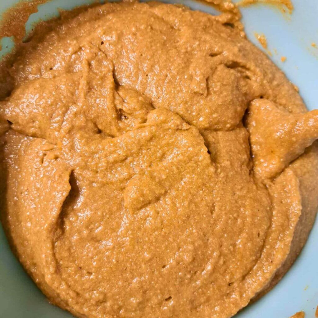 batter for pumpkin cheesecake muffins made with fresh milled flour