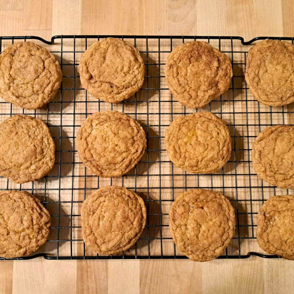 finished pumpkin spice sugar cookies cooling on cooling rack