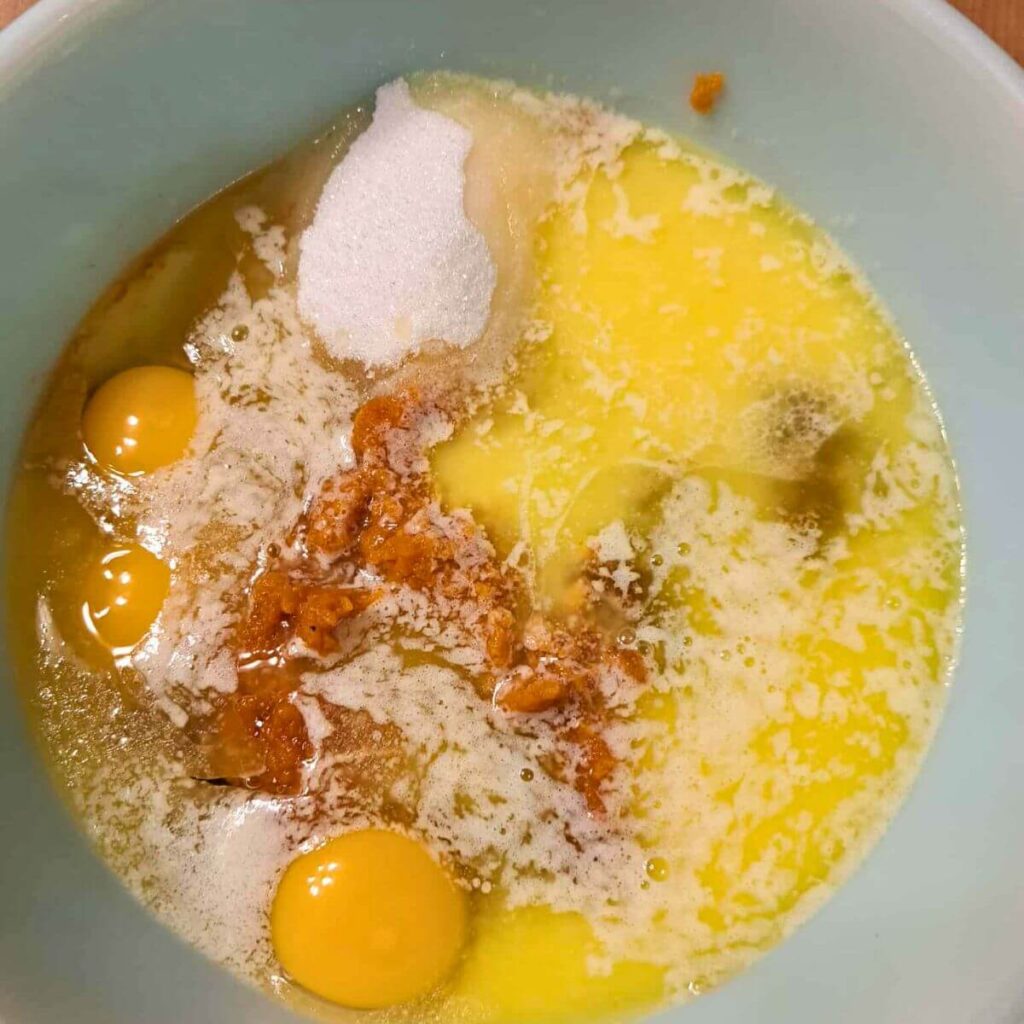 wet ingredients for pumpkin cheesecake muffins made with fresh milled flour