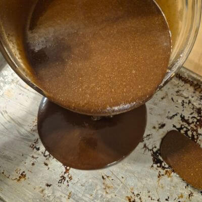 pour Texas sheet cake onto greased baking sheet